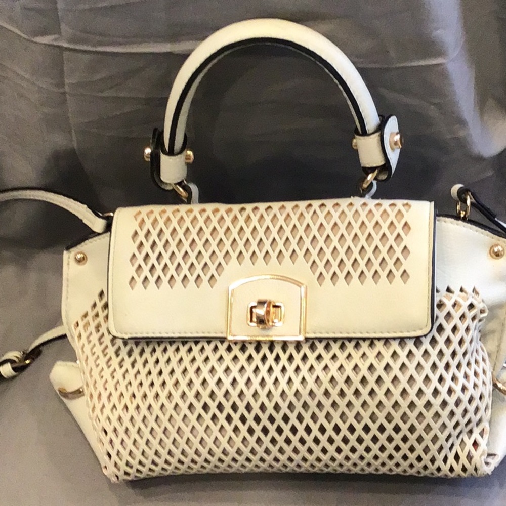 Urban Expressions handbag zippered pocket and 2 pockets inside. Gold trim